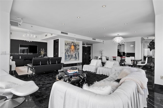 1425 Brickell Ave Unit 42E, Miami, FL 33131 - living room with a chandelier and recessed lighting