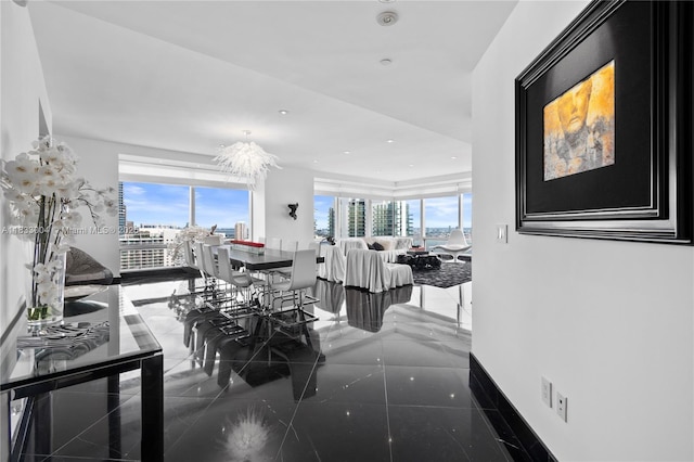 1425 Brickell Ave Unit 42E, Miami, FL 33131 - dining room with plenty of natural light, recessed lighting, and granite tiled floors