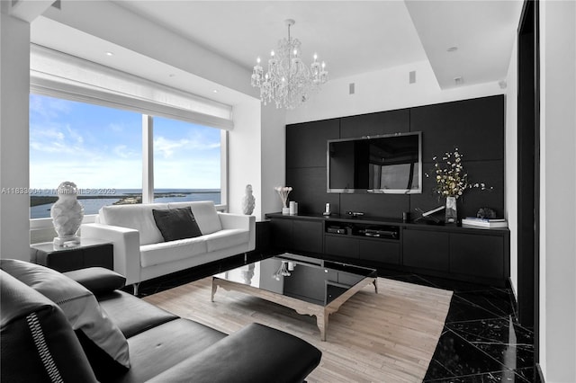 1425 Brickell Ave Unit 42E, Miami, FL 33131 - living room featuring a chandelier, light marble finish flooring, recessed lighting, and inlaid floor details