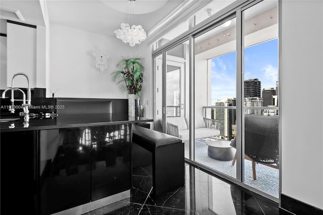 1425 Brickell Ave Unit 42E, Miami, FL 33131 - bathroom with a chandelier, marble tiled flooring, vanity, and a city view