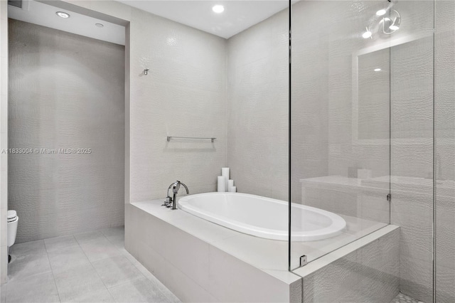 1425 Brickell Ave Unit 42E, Miami, FL 33131 - full bath featuring a bath, recessed lighting, and tile patterned flooring