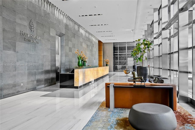 1425 Brickell Ave Unit 42E, Miami, FL 33131 - welcome area featuring tile walls