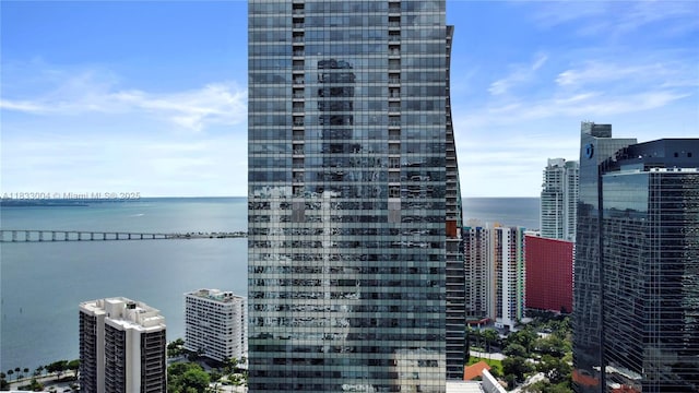 1425 Brickell Ave Unit 42E, Miami, FL 33131 - view of building exterior featuring a water view and a view of city