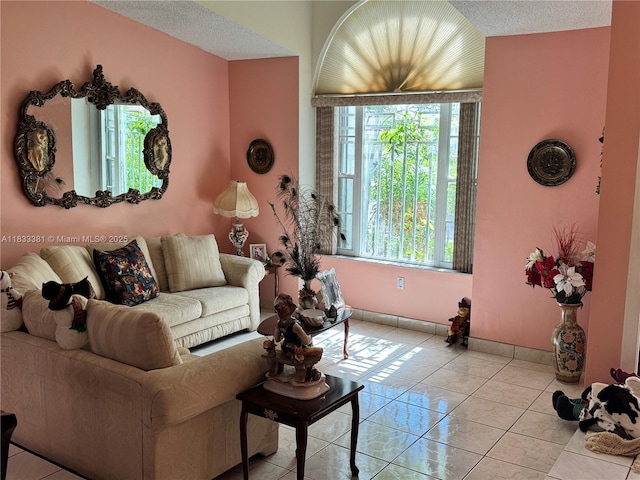 5450 SW 143rd Ct, Miami, FL 33175 - living room featuring a textured ceiling and light tile patterned flooring