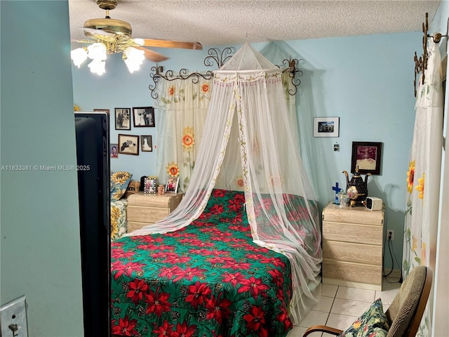5450 SW 143rd Ct, Miami, FL 33175 - bedroom with tile patterned floors, a textured ceiling, and a ceiling fan