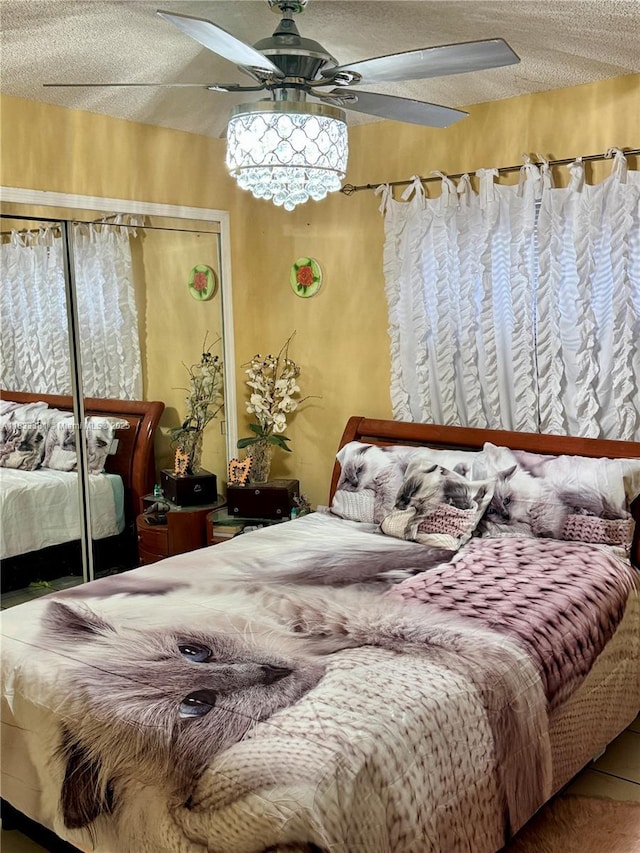 5450 SW 143rd Ct, Miami, FL 33175 - bedroom featuring a textured ceiling and a ceiling fan