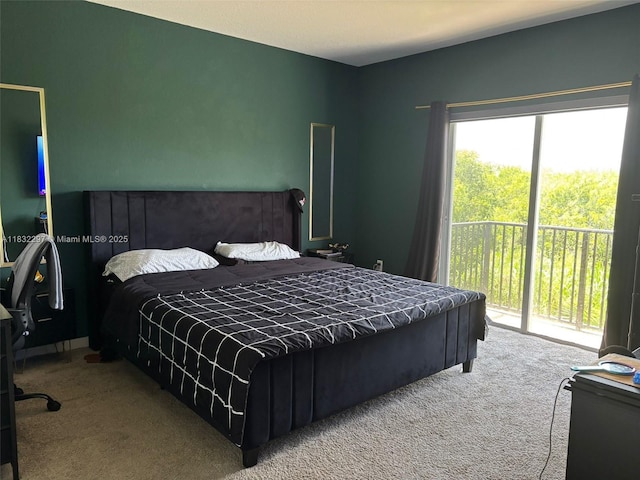 830 SE 19th St, Homestead, FL 33034 - bedroom with carpet flooring, multiple windows, and access to outside