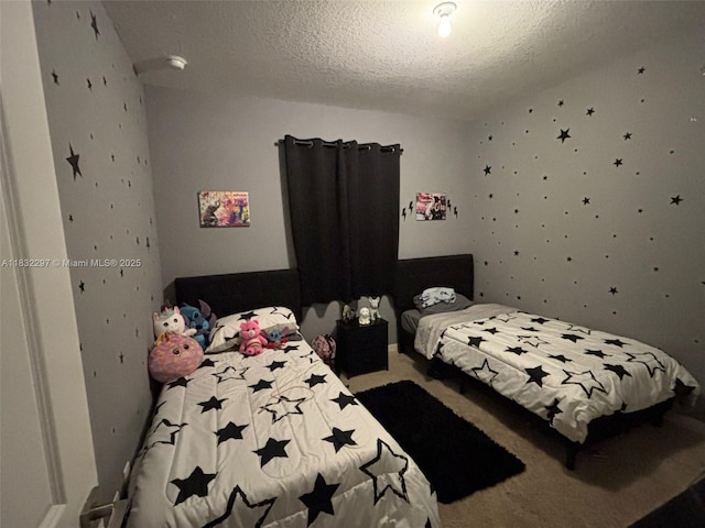 830 SE 19th St, Homestead, FL 33034 - bedroom with carpet floors and a textured ceiling