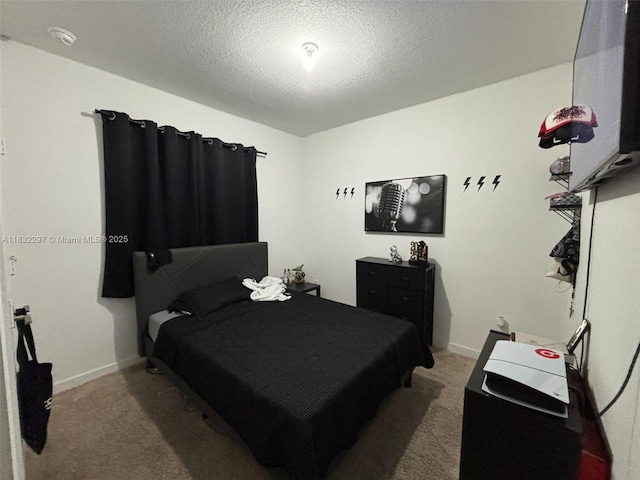 830 SE 19th St, Homestead, FL 33034 - carpeted bedroom with a textured ceiling and baseboards