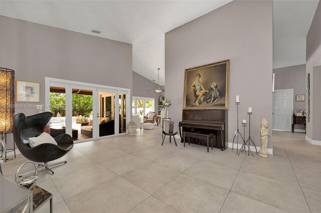 14460 Glencairn Rd, Miami Lakes, FL 33016 - living area featuring high vaulted ceiling, light tile patterned flooring, french doors, and a ceiling fan