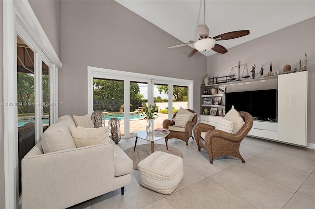 14460 Glencairn Rd, Miami Lakes, FL 33016 - living area with high vaulted ceiling, ceiling fan, light tile patterned flooring, and french doors