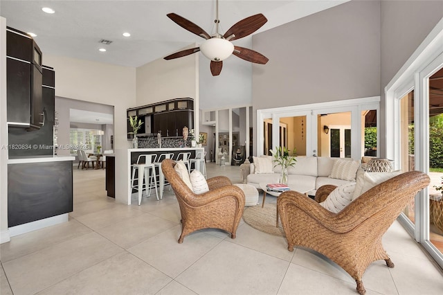 14460 Glencairn Rd, Miami Lakes, FL 33016 - living area featuring a high ceiling, a ceiling fan, recessed lighting, and light tile patterned floors