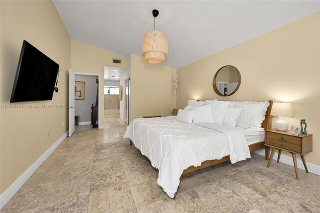14460 Glencairn Rd, Miami Lakes, FL 33016 - bedroom with light stone finish flooring, vaulted ceiling, and ensuite bathroom