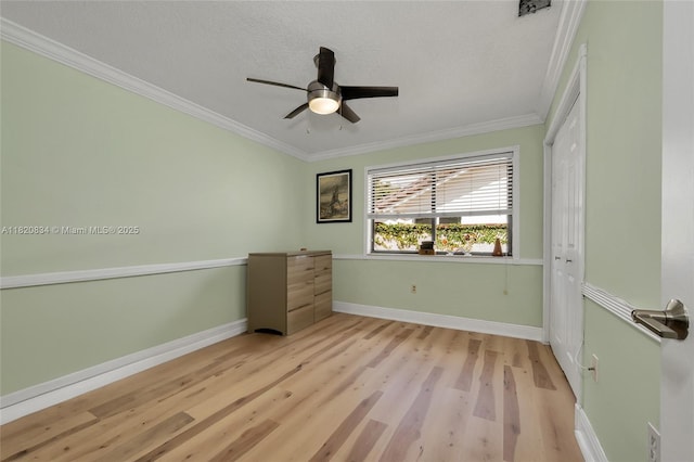 14460 Glencairn Rd, Miami Lakes, FL 33016 - unfurnished bedroom featuring ornamental molding, wood finished floors, a closet, and ceiling fan