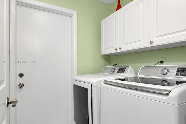 14460 Glencairn Rd, Miami Lakes, FL 33016 - washroom featuring cabinet space and washing machine and dryer
