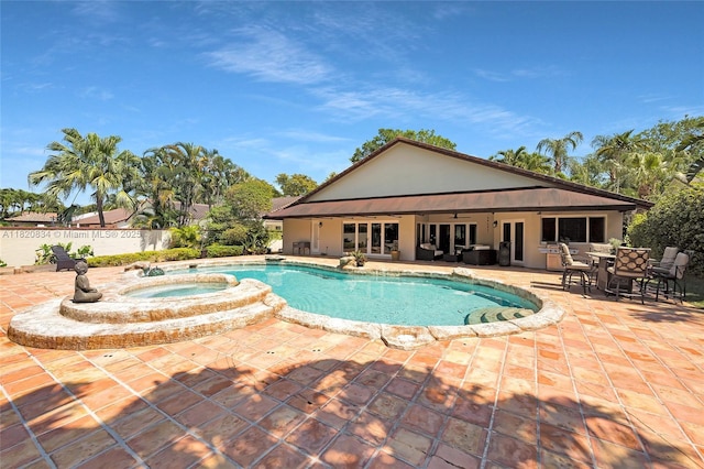 14460 Glencairn Rd, Miami Lakes, FL 33016 - view of swimming pool featuring french doors, a patio area, a ceiling fan, and a pool with connected hot tub