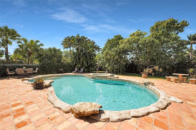 14460 Glencairn Rd, Miami Lakes, FL 33016 - view of pool featuring a patio and a pool with connected hot tub
