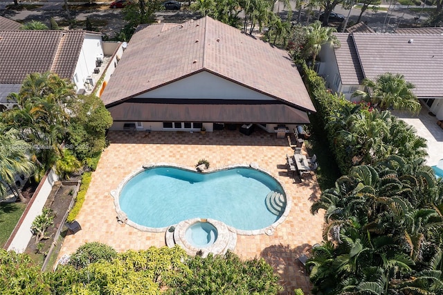 14460 Glencairn Rd, Miami Lakes, FL 33016 - view of swimming pool featuring a patio and a pool with connected hot tub