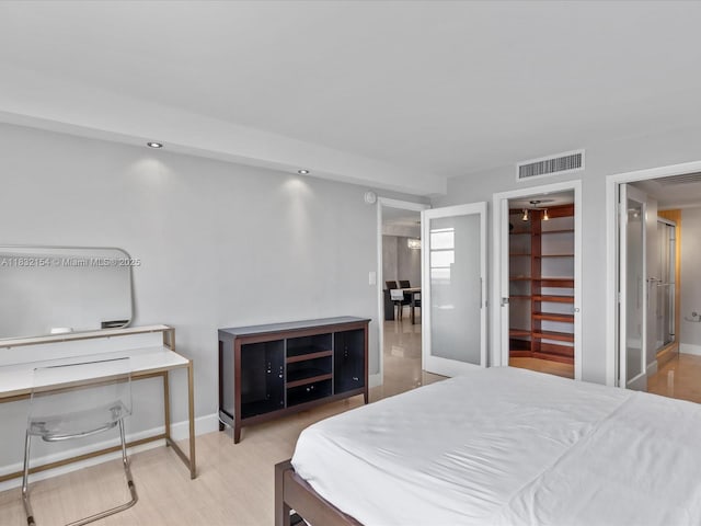 6770 Indian Creek Dr Ph-R, Ph-R Miami Beach, FL 33141 - bedroom featuring baseboards and wood finished floors