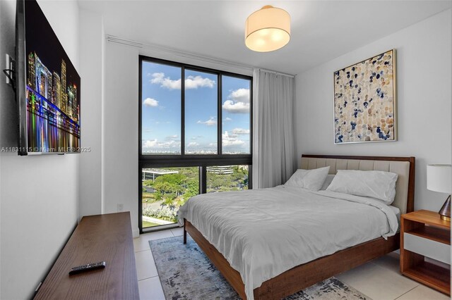 5350 NW 84th Ave Unit 1513, Doral, FL 33166 - bedroom with light tile patterned floors