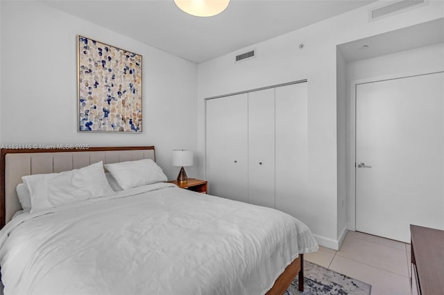 5350 NW 84th Ave Unit 1513, Doral, FL 33166 - bedroom with a closet and light tile patterned floors