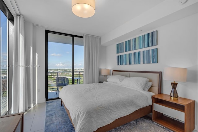 5350 NW 84th Ave Unit 1513, Doral, FL 33166 - tiled bedroom featuring expansive windows and access to outside