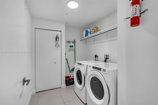 5350 NW 84th Ave Unit 1513, Doral, FL 33166 - washroom with independent washer and dryer and light tile patterned floors