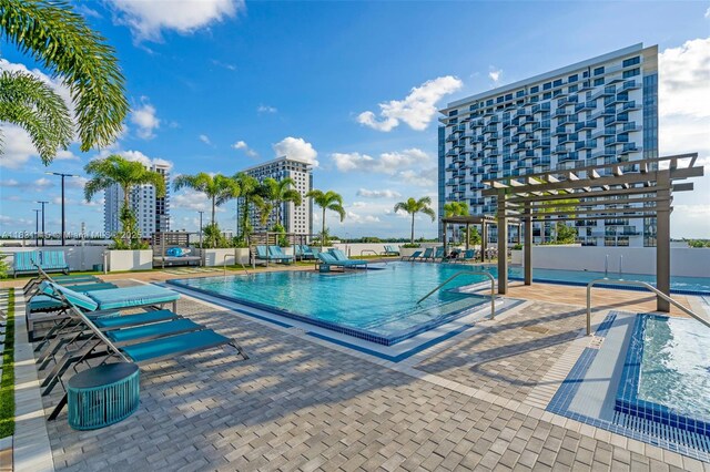 5350 NW 84th Ave Unit 1513, Doral, FL 33166 - community pool featuring a patio
