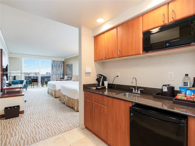 18001 Collins Ave Unit 1416-1417-1418, Sunny Isles Beach, FL 33160 - kitchen featuring black microwave, fridge, open floor plan, dark stone counters, and brown cabinets