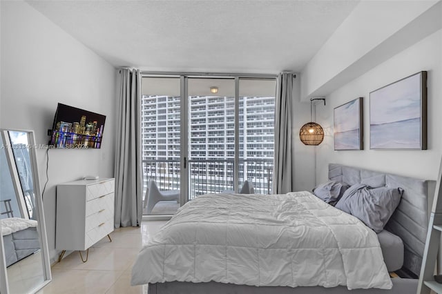1750 N Bayshore Dr Unit 1204, Miami, FL 33132 - tiled bedroom featuring multiple windows and access to outside