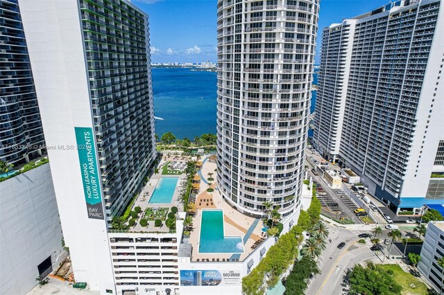 1750 N Bayshore Dr Unit 1204, Miami, FL 33132 - drone / aerial view of a pool area and a nearby body of water