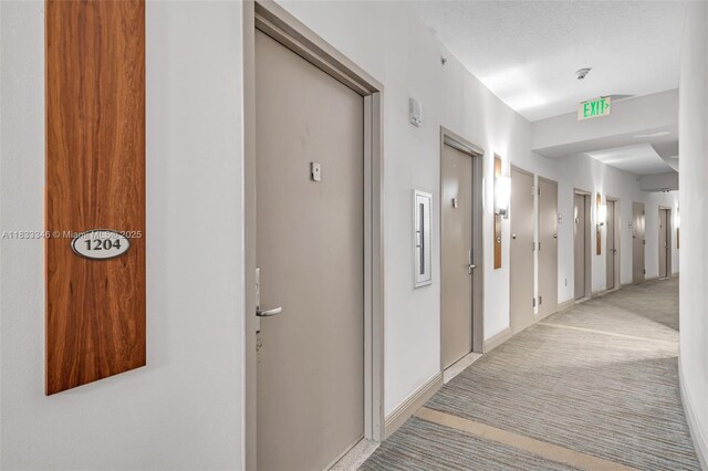 1750 N Bayshore Dr Unit 1204, Miami, FL 33132 - corridor with light colored carpet