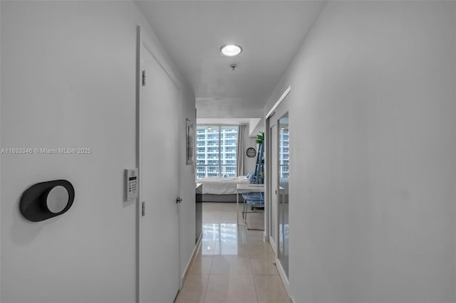 1750 N Bayshore Dr Unit 1204, Miami, FL 33132 - hall with light tile patterned floors and baseboards
