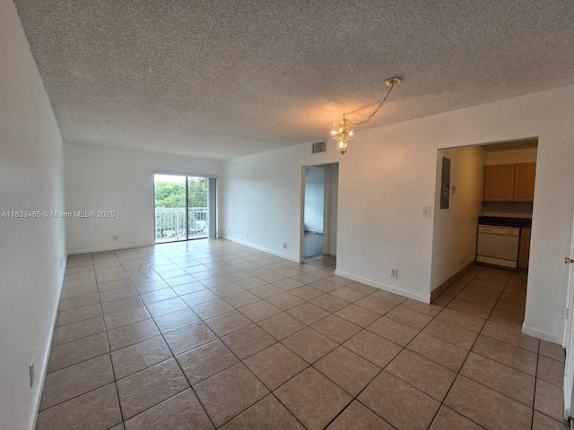 405 S Pine Island Rd Unit 401D, Plantation, FL 33324 - spare room with a chandelier, light tile patterned floors, a textured ceiling, and electric panel