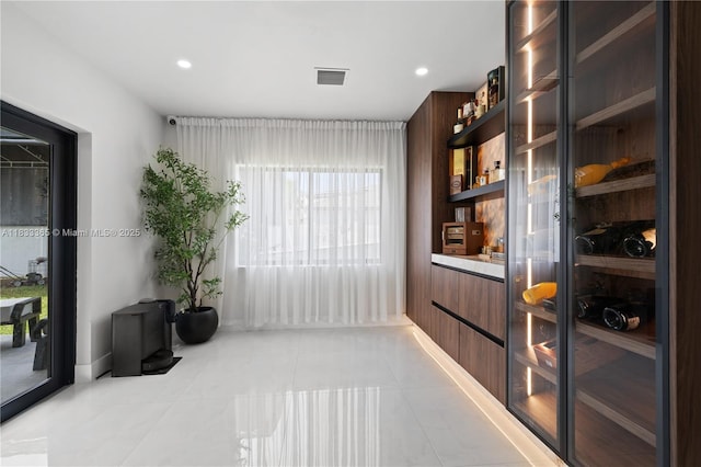 18082 SW 152nd Ct, Miami, FL 33187 - interior space with light tile patterned floors and recessed lighting
