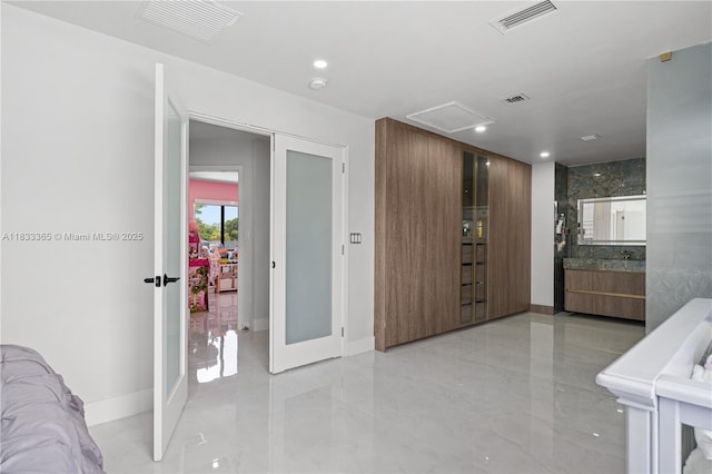 18082 SW 152nd Ct, Miami, FL 33187 - hallway with recessed lighting and light marble finish flooring