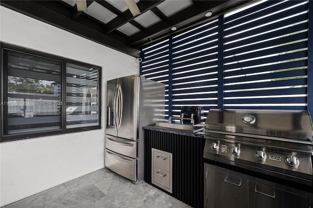 18082 SW 152nd Ct, Miami, FL 33187 - kitchen with stainless steel fridge with ice dispenser and dark countertops