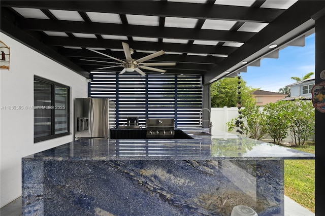 18082 SW 152nd Ct, Miami, FL 33187 - view of patio with ceiling fan and exterior kitchen