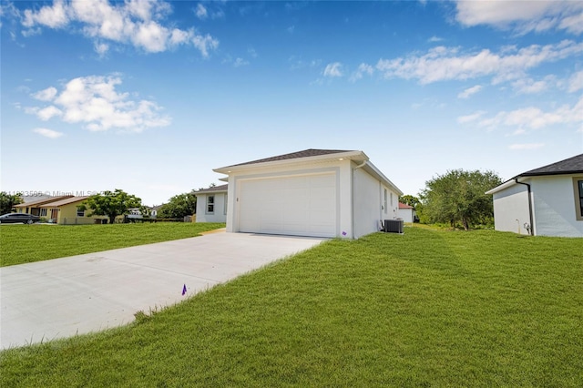 2506 5th St SW, Lehigh Acres, FL 33976 - view of front of house with a front lawn, driveway, a garage, and stucco siding