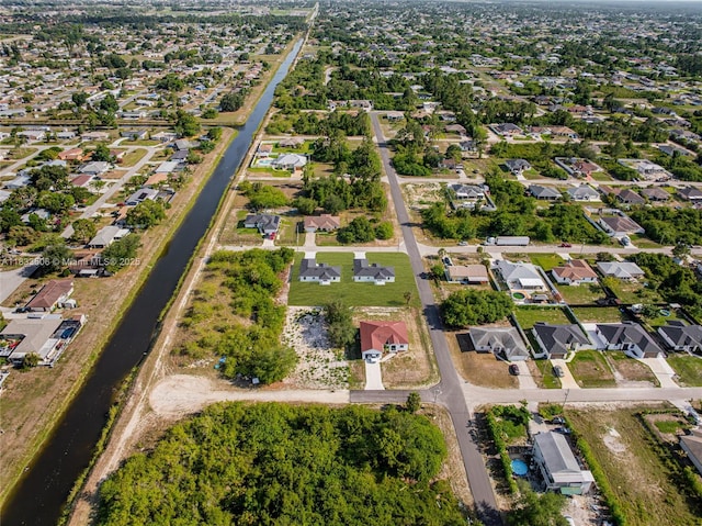 2506 5th St SW, Lehigh Acres, FL 33976 - view of property location featuring nearby suburban area and a large body of water