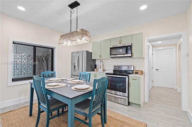 742 NW 70th St, Miami, FL 33150 - dining space featuring light wood-style floors and recessed lighting