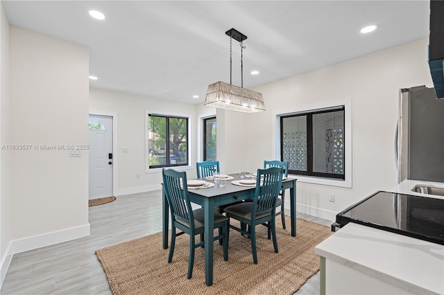 742 NW 70th St, Miami, FL 33150 - dining room featuring recessed lighting and light wood-style floors