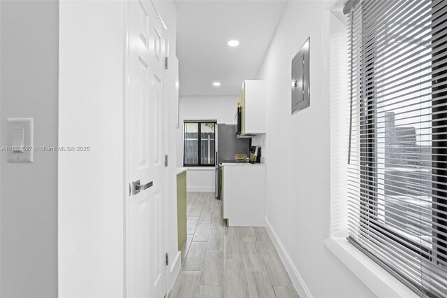742 NW 70th St, Miami, FL 33150 - kitchen with green cabinets, stainless steel appliances, light countertops, recessed lighting, and light wood-style flooring