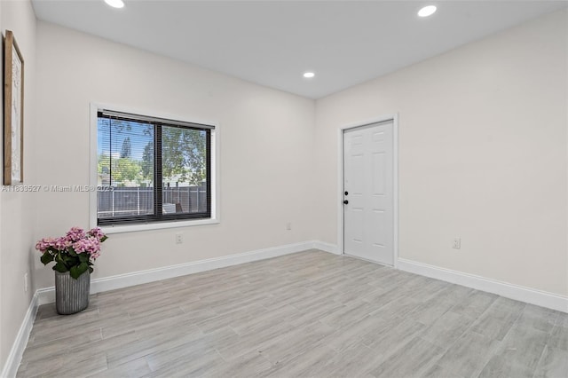 742 NW 70th St, Miami, FL 33150 - empty room with recessed lighting and light wood finished floors