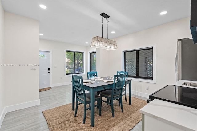 742 NW 70th St, Miami, FL 33150 - dining room with recessed lighting and light wood-type flooring