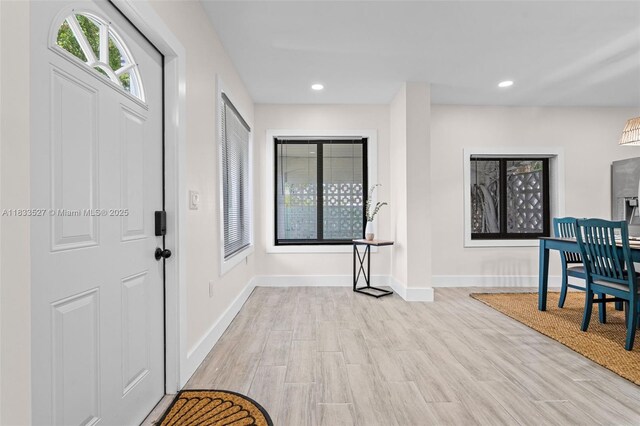742 NW 70th St, Miami, FL 33150 - dining area featuring light wood-style flooring and recessed lighting