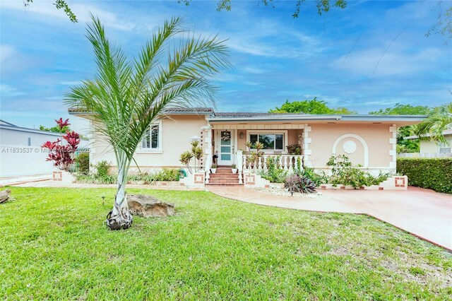 6250 SW 19th St, Miami, FL 33155 - view of front of property featuring stucco siding, a front yard, and a porch