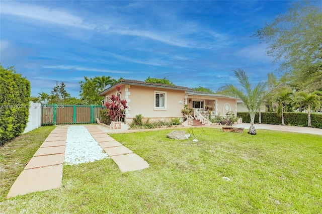 6250 SW 19th St, Miami, FL 33155 - view of front of home with a gate, stucco siding, and covered porch