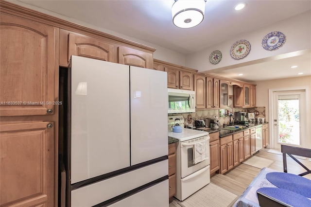 6250 SW 19th St, Miami, FL 33155 - kitchen with white appliances, healthy amount of natural light, glass insert cabinets, decorative backsplash, and recessed lighting