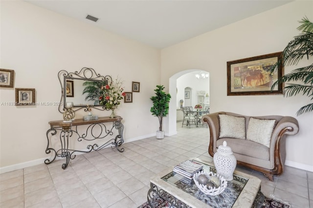 9364 SW 164th Ct, Miami, FL 33196 - living room featuring arched walkways and light tile patterned floors